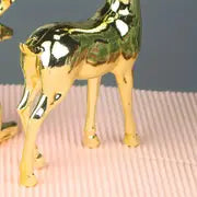 Pair of Gold-Plated Reindeer Statues