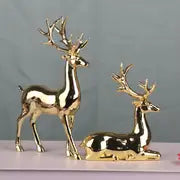 Pair of Gold-Plated Reindeer Statues